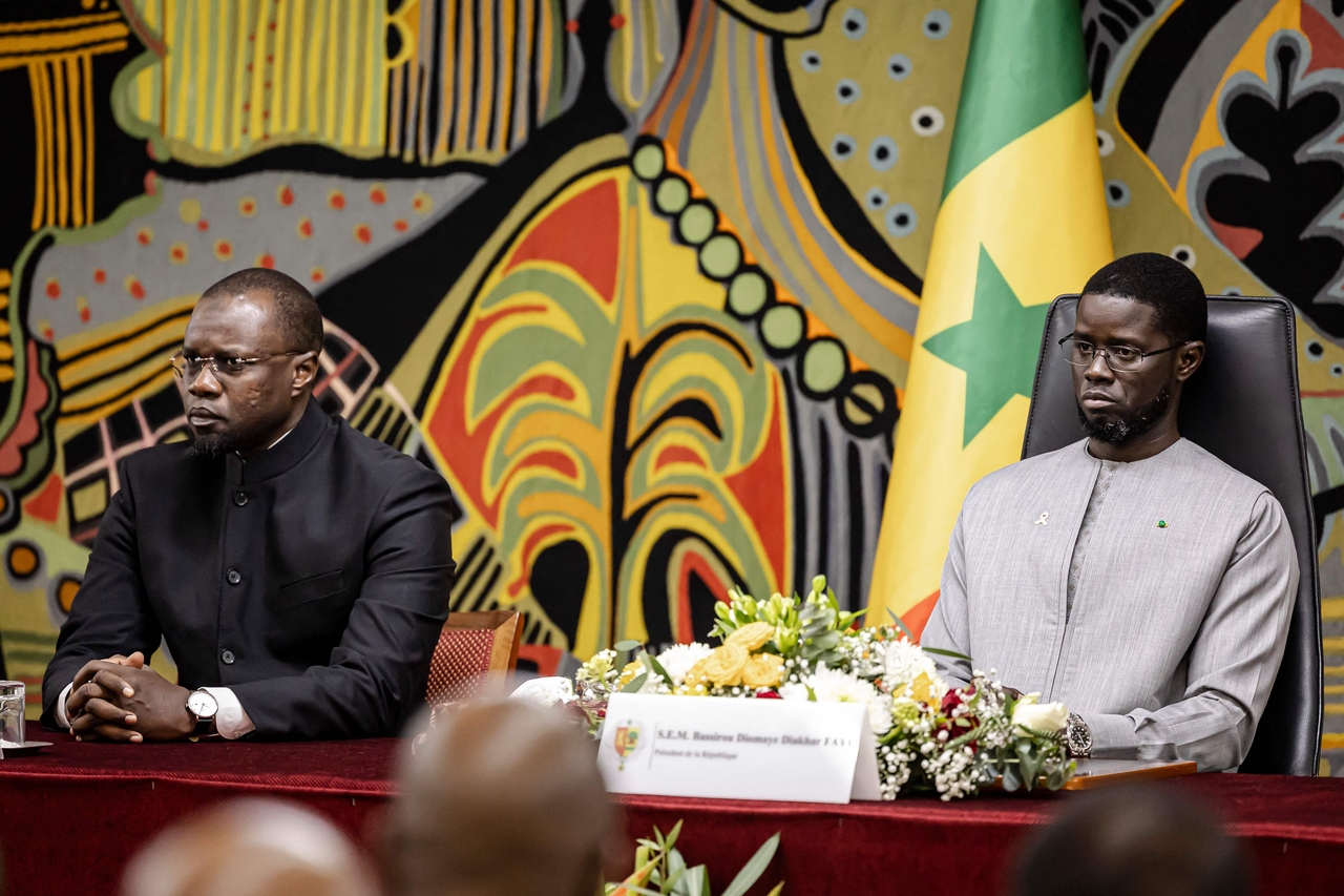 Senegal's then-Prime Minister Ousmane Sonko (left) and the country's President Bassirou Diomaye Faye attend a ceremony in Dakar, Senegal, in 2025. (AFP-Yonhap)
