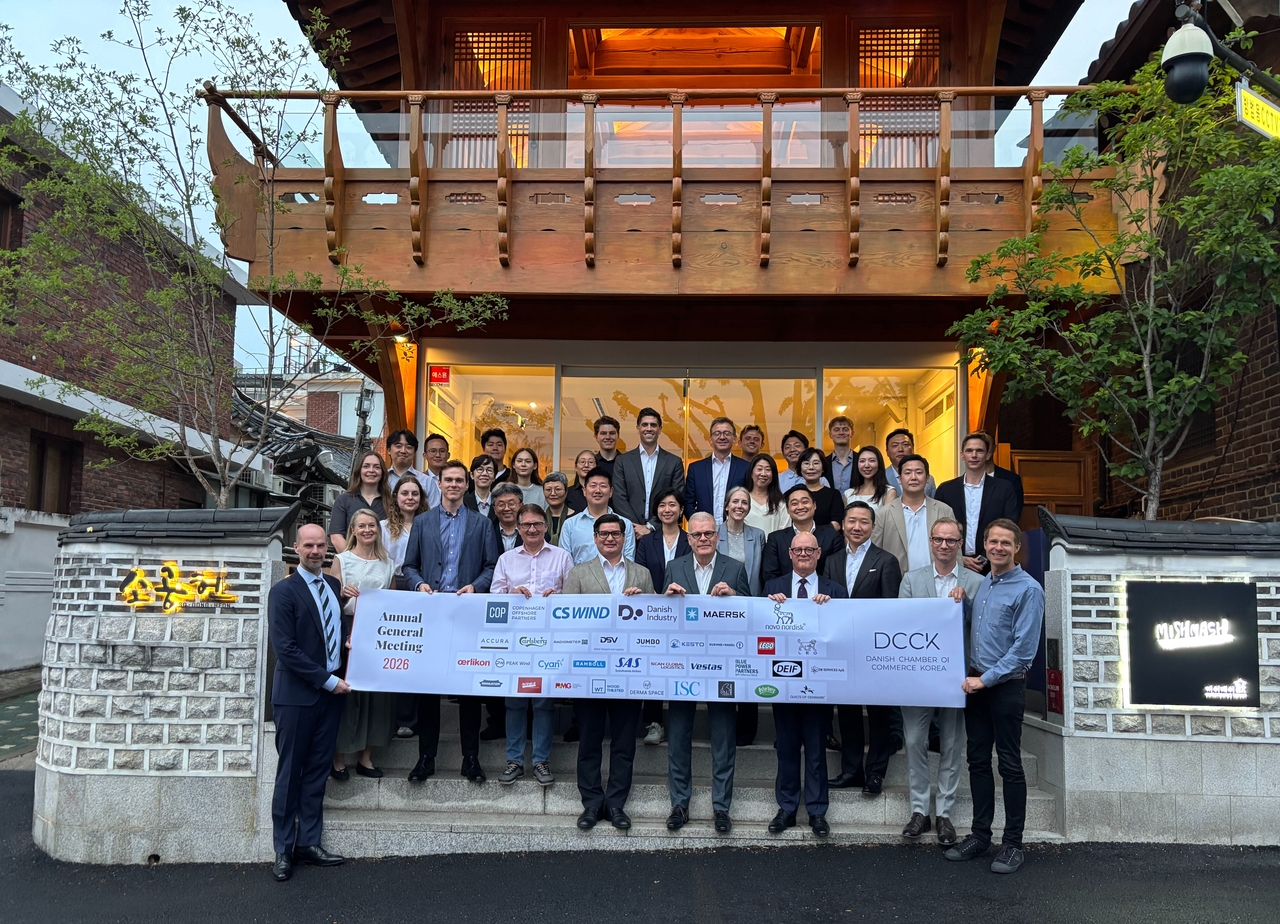 Jan Benggaard (third from right, front row) and representatives of member companies pose for a photo at the launch event of the Danish Chamber of Commerce in Korea on Tuesday. (DCCK)