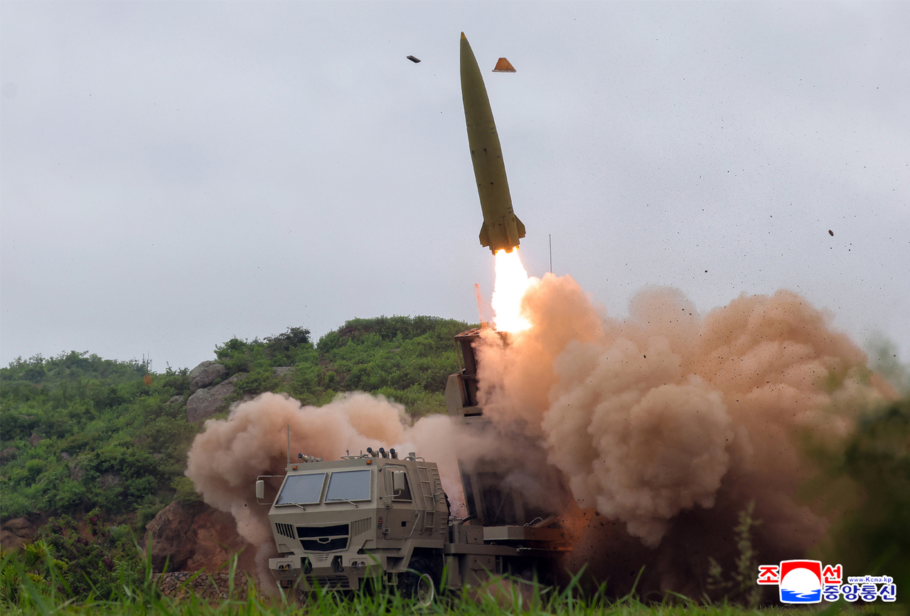 North Korea tests a newly developed lightweight multipurpose missile launching system and multiple tactical cruise missile weapon system at an unspecified location on May 26, 2026, in this photo released by the North's official Korean Central News Agency the next day. (Yonhap)