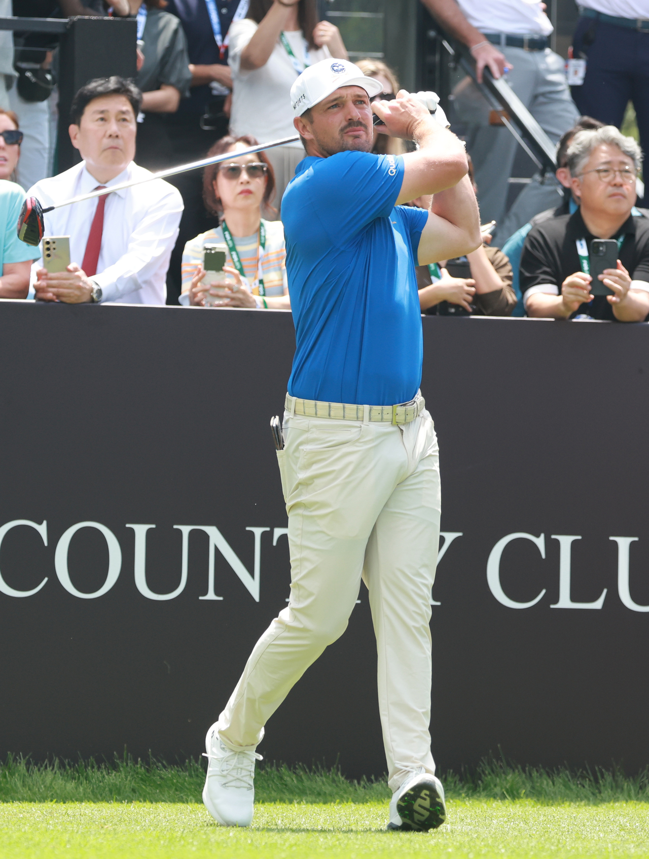 Bryson DeChambeau tees off on the first hole during the LIV Golf Korea tournament at Asiad Country Club in Busan, Thursday. (Yonhap)