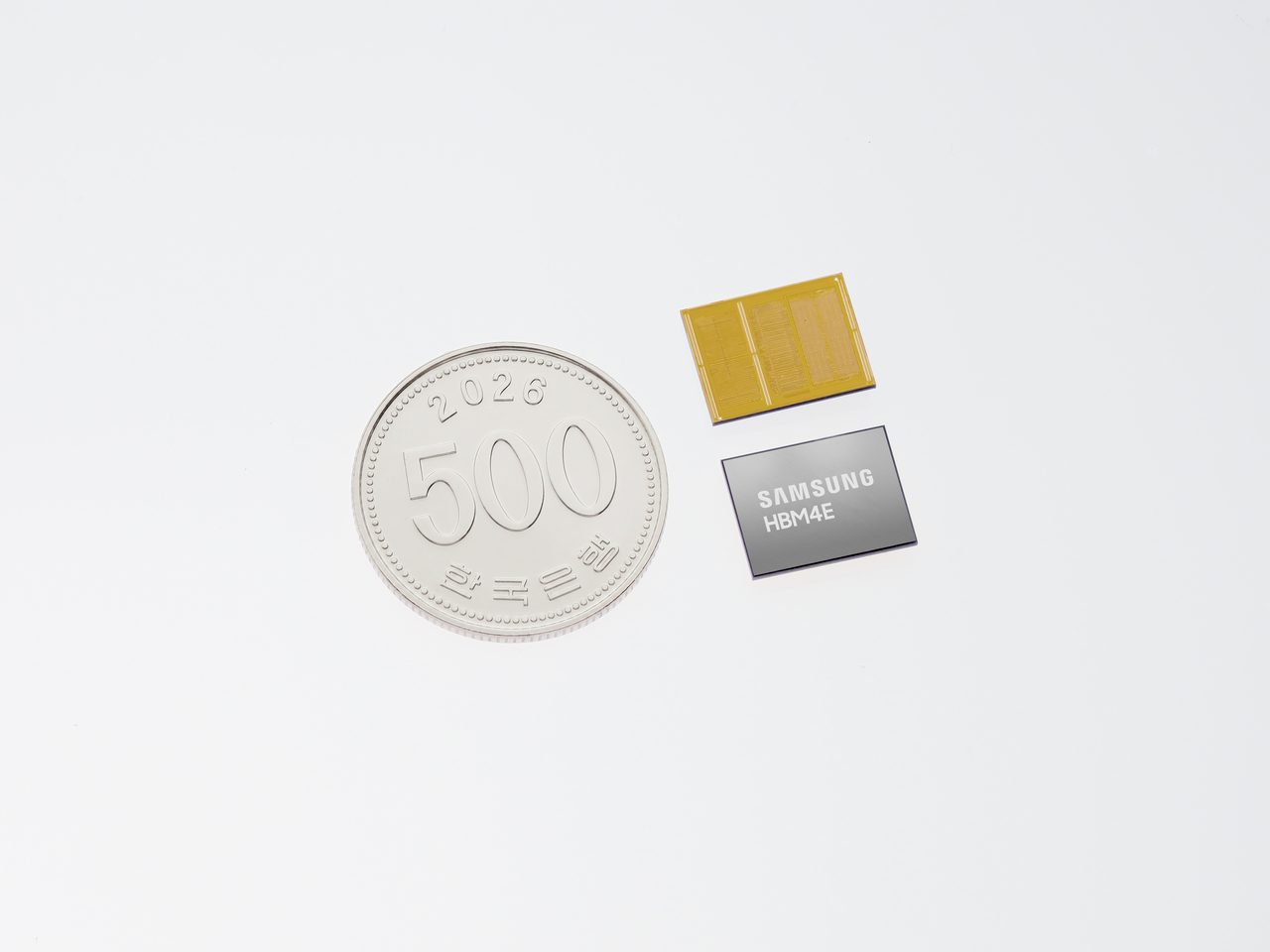 Samsung Electronics’ 12-layer HBM4E product is seen next to a 500 won coin. (Samsung Electronics)