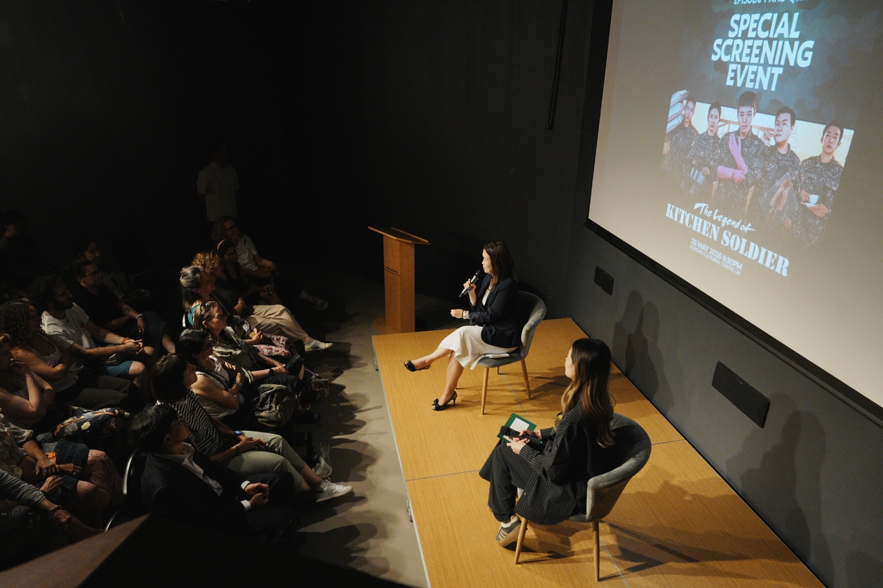 The event hosts talk to the audience at a special screening of "The Legend of Kitchen Soldier" held in London, the UK, on Thursday. (CJ ENM)