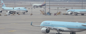 Air travel takes hit from record-high fuel surcharges