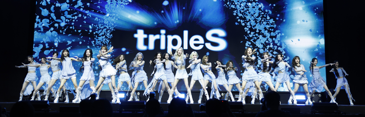 TripleS performs "Baby Flower" during a media showcase for “Love & Pop Pt. 1" held at Blue Square Woori Won Banking Hall in Yongsan-gu, central Seoul, Monday. (Newsis)