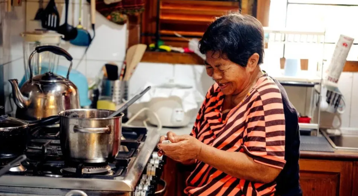 Pani, a live-in domestic worker, begins her day at her employer‘s home in South Tangerang, outside Jakarta.    (Straits Times)
