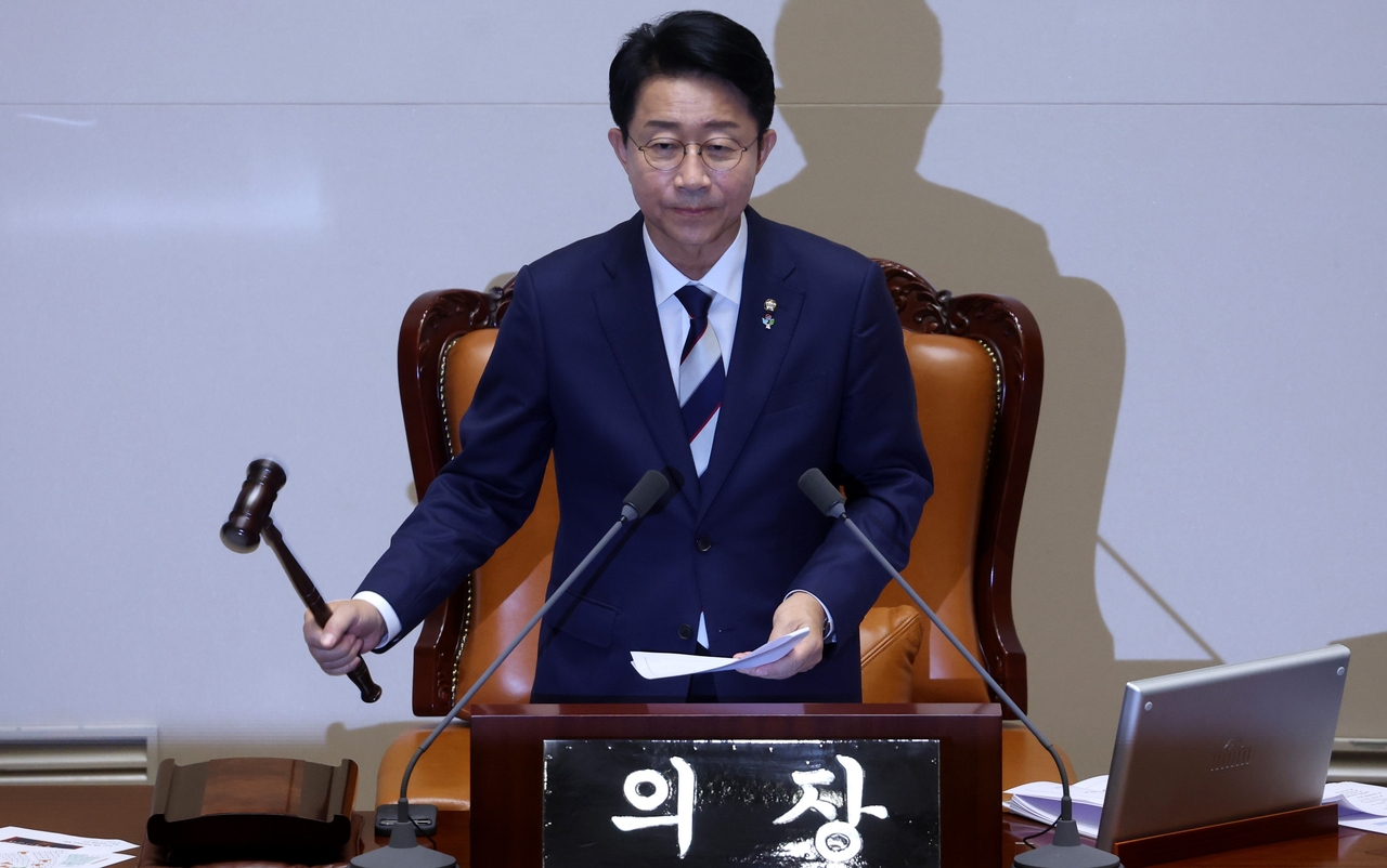 Rep. Cho Jeong-sik hits a gavel as he presides over a plenary session of the National Assembly on Friday. (National Assembly Secretariat)