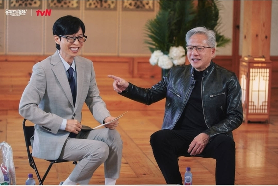 Nvidia CEO Jensen Huang speaks with Yoo Jae-suk, the host of popular tvN talk show "YouQuiz on the Block," on Saturday. (tvN Instagram)