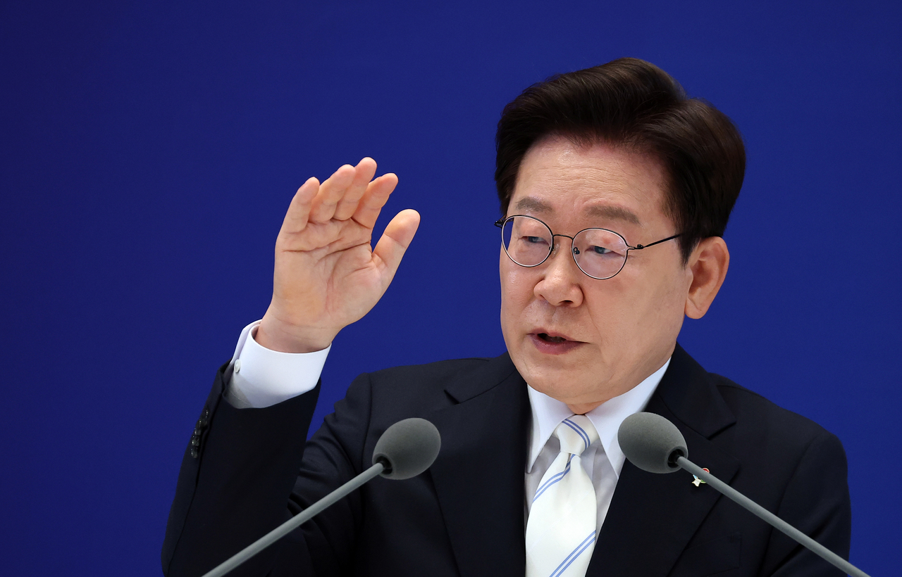 President Lee Jae Myung speaks during a press conference on Monday, marking the first anniversary of his inauguration on June 4 the previous year (Yonhap)