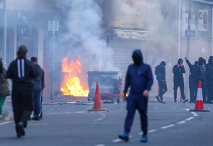 Protests grow in Belfast over stabbing