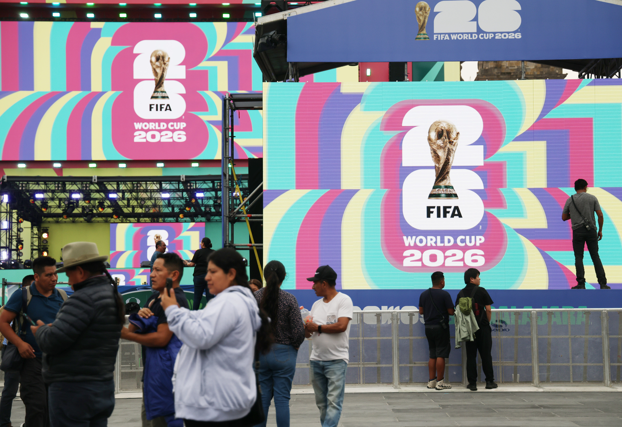 Residents pose for photos at a public square set up to promote the 2026 FIFA World Cup in downtown Guadalajara on June 9 (local time), ahead of the tournament in Mexico, Canada and the United States. (Yonhap)