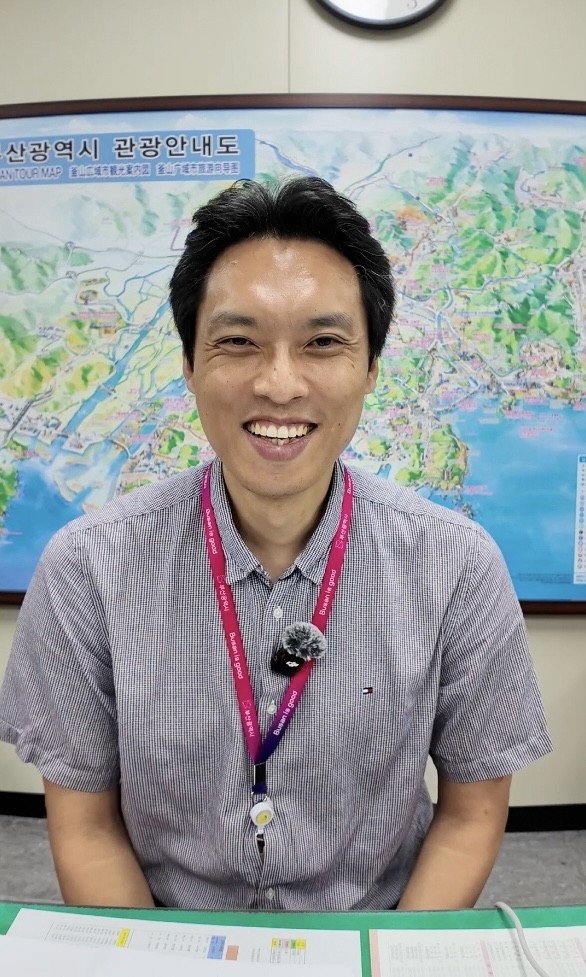 Kim Dong-hoon, director of Busan Metropolitan City's Tourism Policy Division, speaks about preparations for the Welcome Center and other BTS-related tourism programs. (Tammy Park/The Korea Herald)