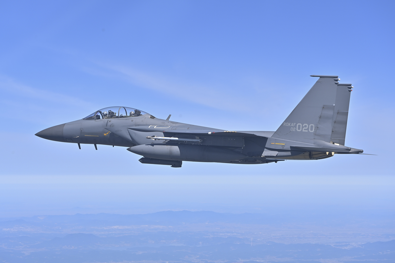 An unrelated photograph shows a Korean Air Force F-15K fighter during a training exercise. (Air Force)
