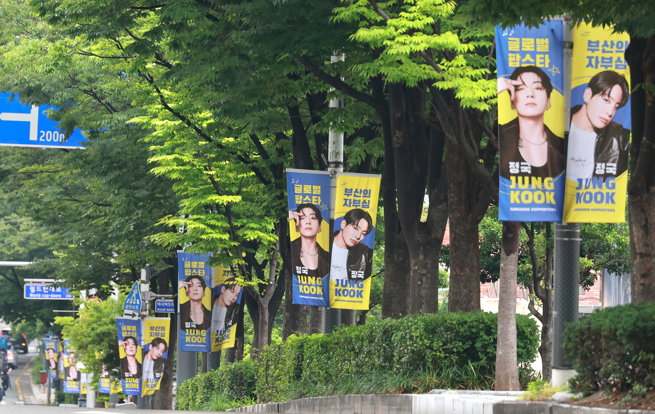 A banner of BTS member Jungkook reading "The Pride of Busan" is displayed near Sports Complex Station, a key transit point for concertgoers heading to Busan Asiad Main Stadium. (Yonhap)
