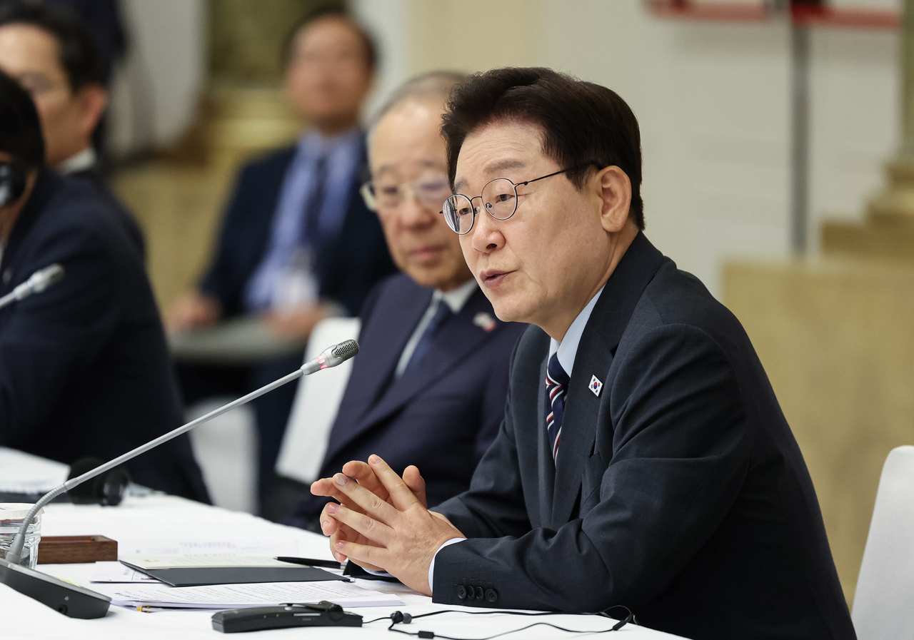 President Lee Jae Myung attends a business roundtable at a hotel in Rome on Friday. (Yonhap)