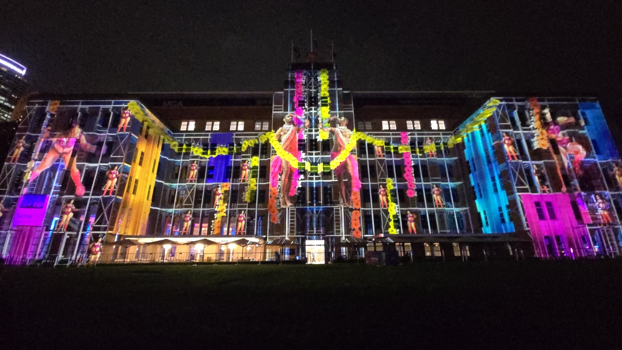 A projection media artwork at the Museum of Contemporary Art depicting the history of immigration to Australia