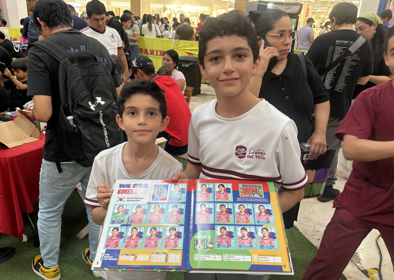 Young collectors display stickers of South Korea's national team during a Panini sticker trading event at a shopping mall in Zapopan, near Guadalajara, Mexico, one of the host cities of the 2026 World Cup, on Sunday. (Yonhap)