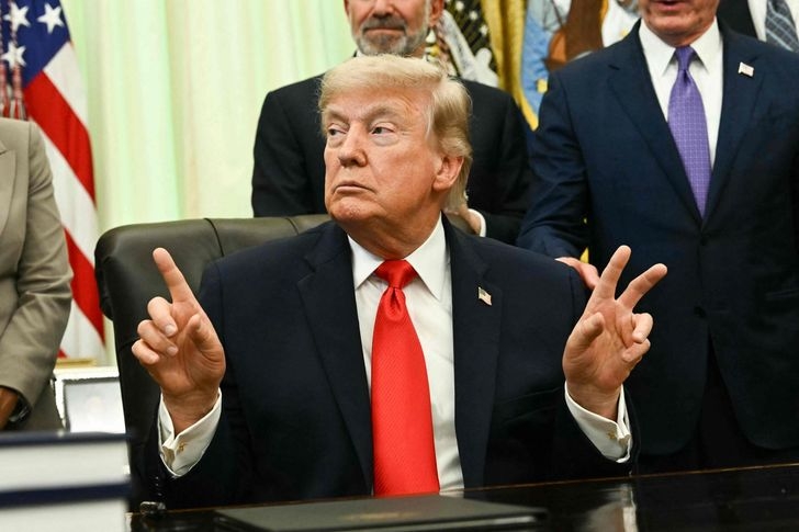 US President Donald Trump speaks before signing a proclamation in the Oval Office of the White House in Washington, DC, June 11. (AFP-Yonhap)