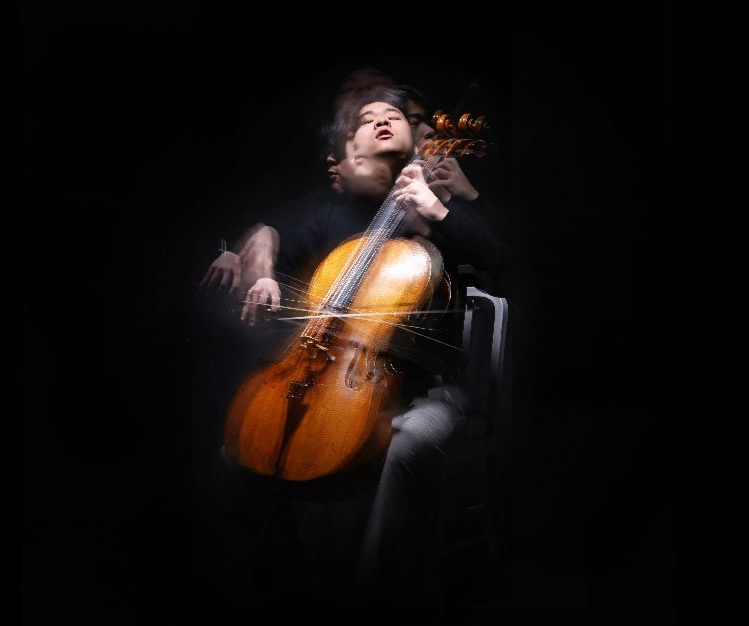 Cellist Han Jae-min poses for photos during an interview with The Korea Herald on Feb. 2, 2023. (Park Hae-mook/The Korea Herald)