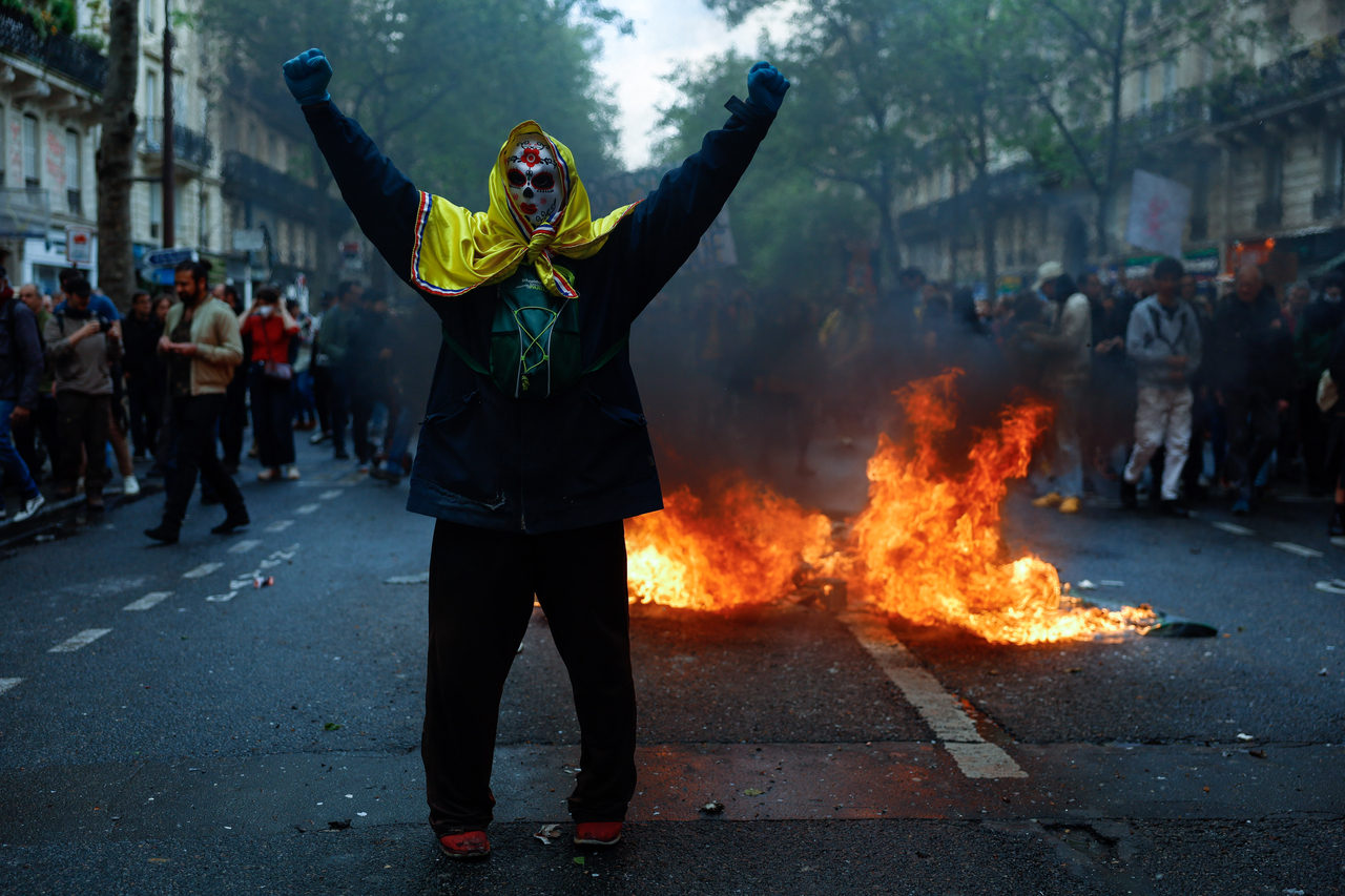 Demonstrators take part in a May Day protest in Paris on May 1, 2023, amid weeks of public outrage over a pension reform law that raised France's retirement age from 62 to 64. (Getty Images)