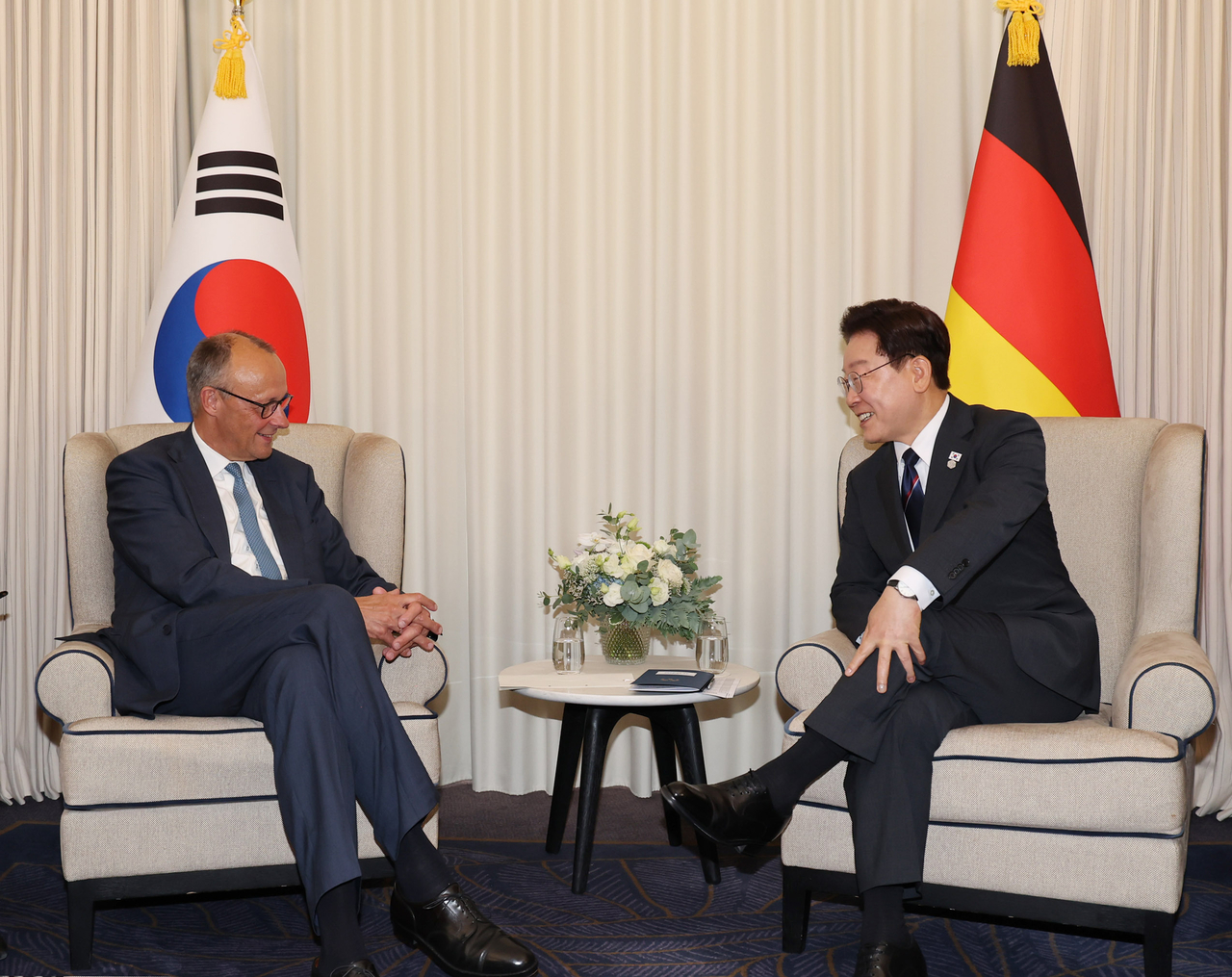 President Lee Jae Myung and German Chancellor Friedrich Merz hold a bilateral meeting on June 16 (local time) at the G7 summit venue in Évian-les-Bains, France. (Yonhap)