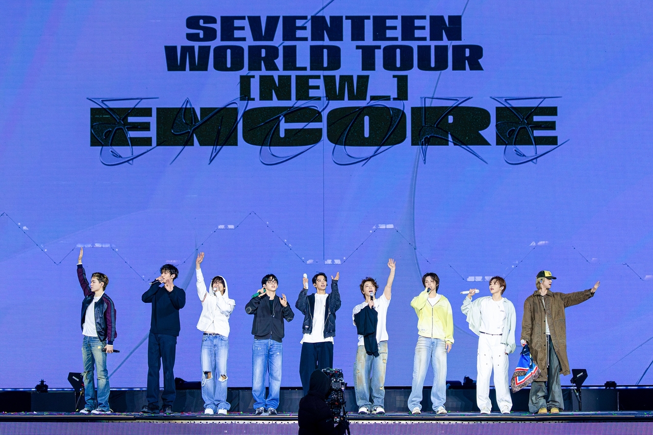 Seventeen performs "To You" during the "New_" encore concert, held at Incheon Asiad Main Stadium in Incheon, Sunday. (Pledis Entertainment)