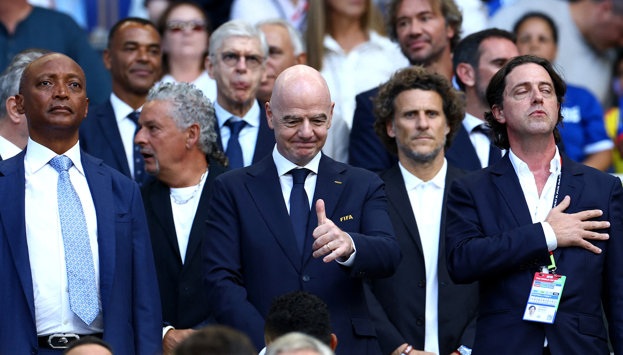 FIFA President Gianni Infantino (center) gestures in the stands before a match between Uruguay and Cape Verde, in Miami Gardens, Florida, Sunday.   (AP-Yonhap)