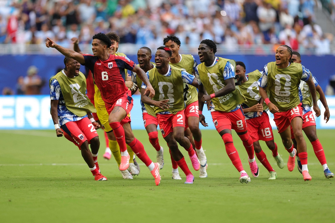 Cabo Verde's Kevin Pina and teammates celebrate their goal against Uruguay, at the Miami Stadium in Miami Gardens, Florida, Sunday.   (AFP-Yonhap)