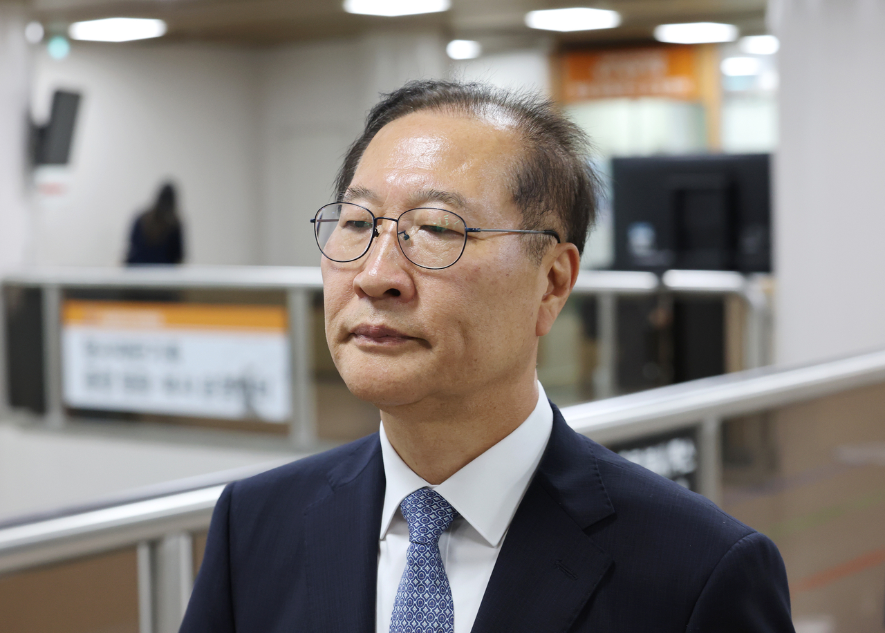 Former Justice Minister Park Sung-jae appears for his trial on charges of playing a key role in former President Yoon Suk Yeol's martial law bid and granting undue favors to Yoon's wife, Kim Keon Hee, at the Seoul Central District Court in southern Seoul on Monday. (Yonhap)