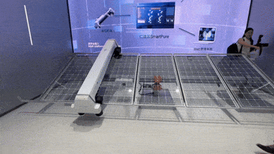 Sungrow demonstrates a robotic cleaning system designed to remove snow and other debris from solar panels at the company’s headquarters in Hefei, Anhui Province, on June 12. (Byun Hye-jin/The Korea Herald)