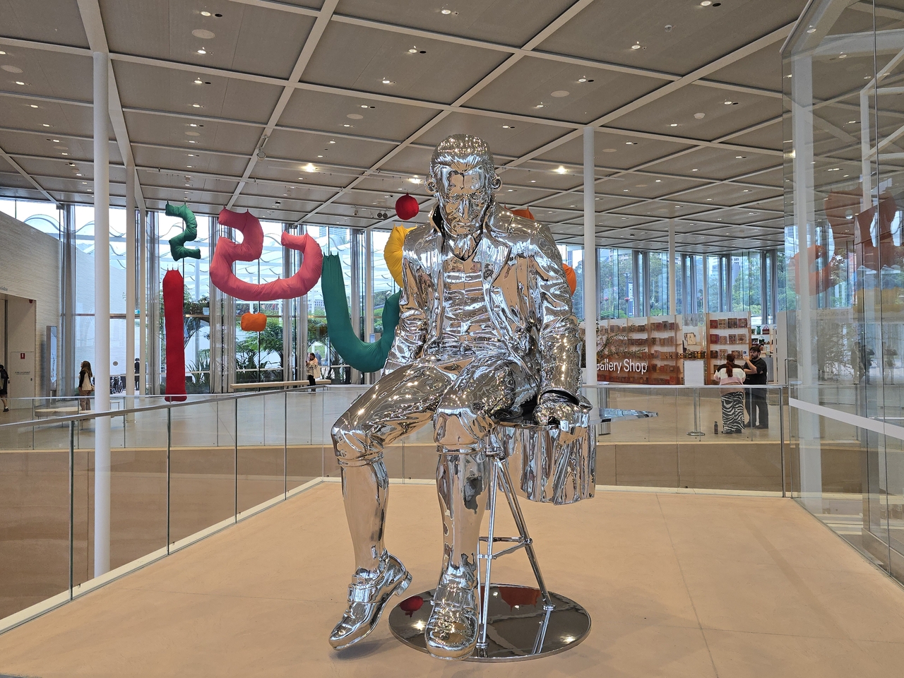 "Uncle Cook, don't overthink it" — a sculpture of Captain Cook at the ground-floor entrance of the gallery's annex