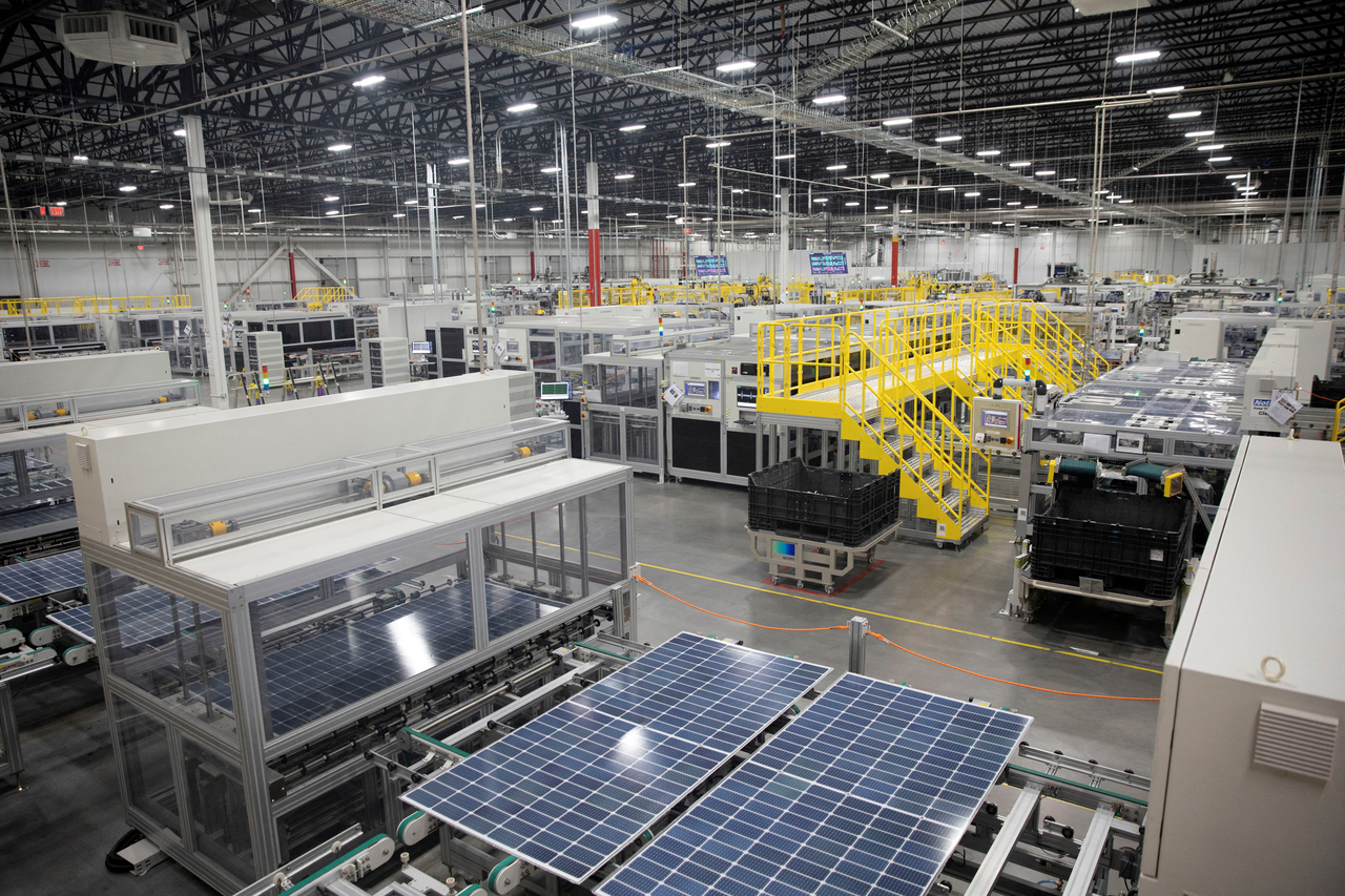 Solar panels are assembled at the Qcells North America factory in Cartersville, Georgia, US, on June 8. (Reuters-Yonhap)