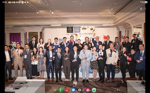 Distinguished guests at the MMC Global Economic Forum pose for a group photo in Bangkok, Thailand, on June 19.