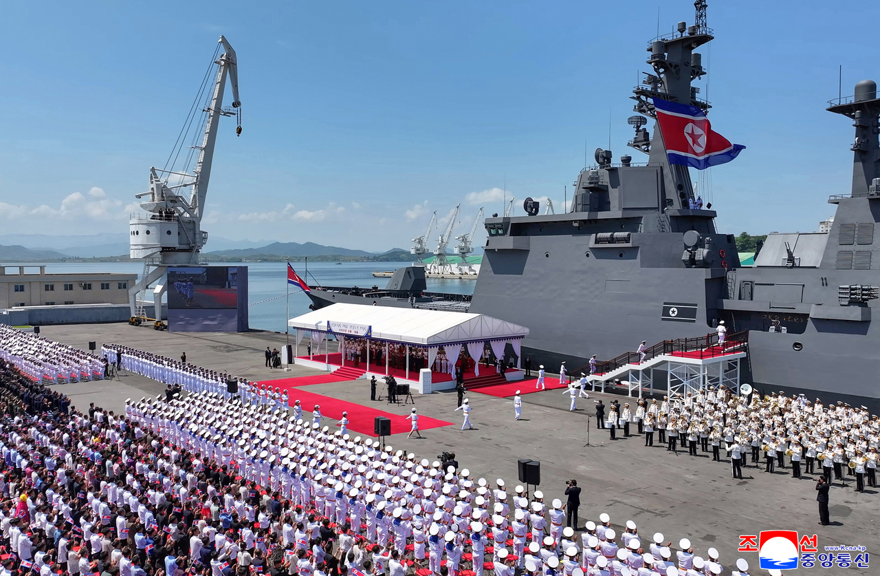 North Korea holds a commissioning ceremony for its 5,000-ton-class destroyer, the “Choe Hyon,” at Nampo Port on Tuesday, with leader Kim Jong-un in attendance. (KCNA via Yonhap)