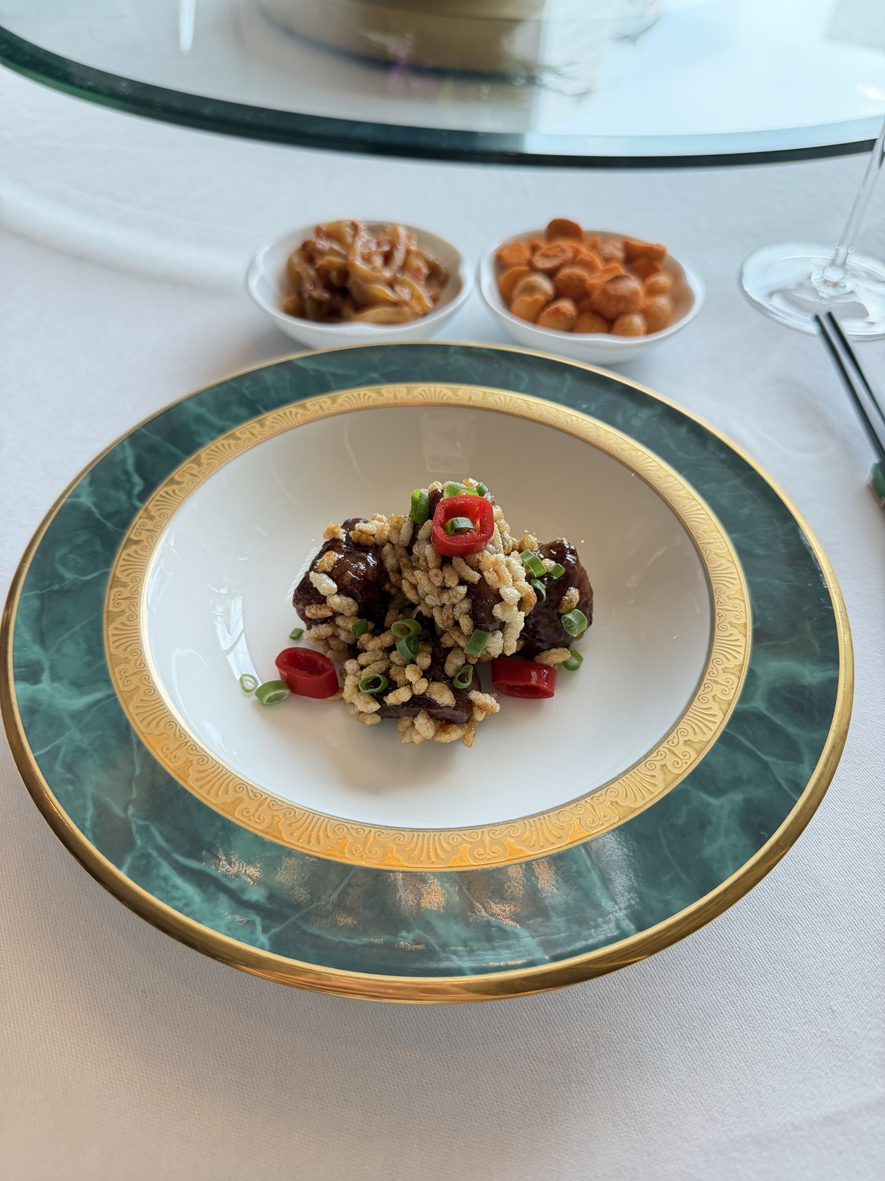 Hanwoo beef 1+ with hawthorn glazed sauce and crispy rice (Hong Yoo/The Korea Herald)