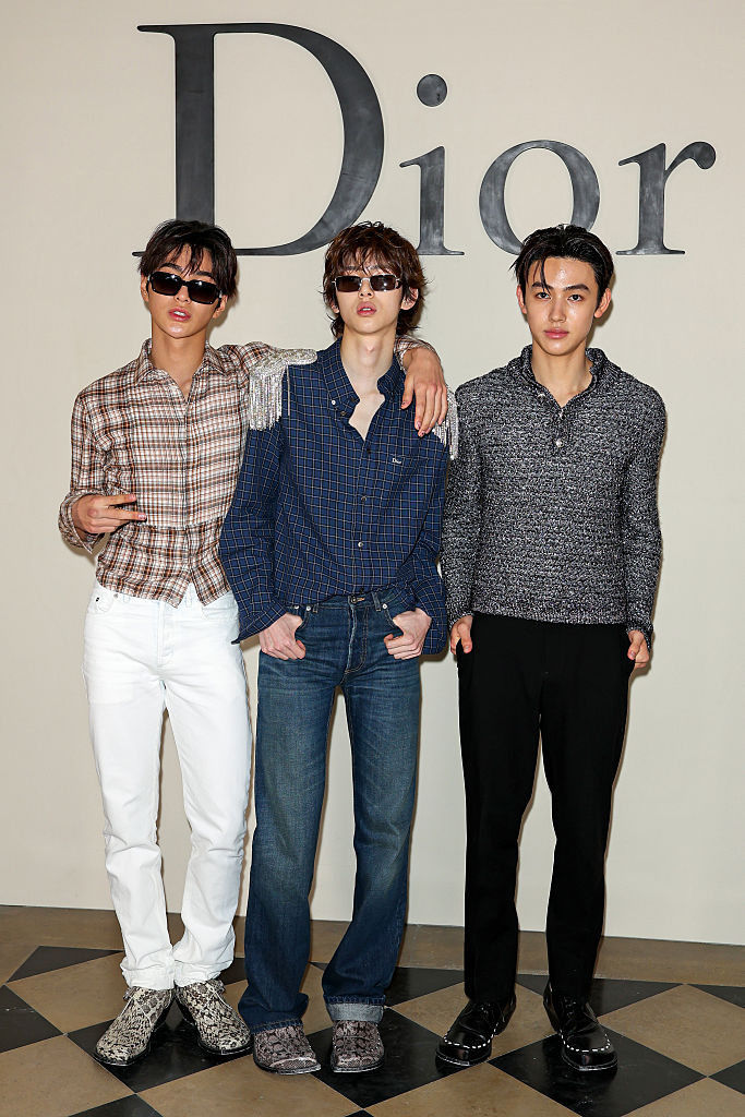 Cortis members Keonho, Juhoon and Seonghyeon attend the Dior Homme Menswear Spring/Summer 2027 show as part of Paris Fashion Week in Paris, France, on June 24, 2026. (Getty Images)