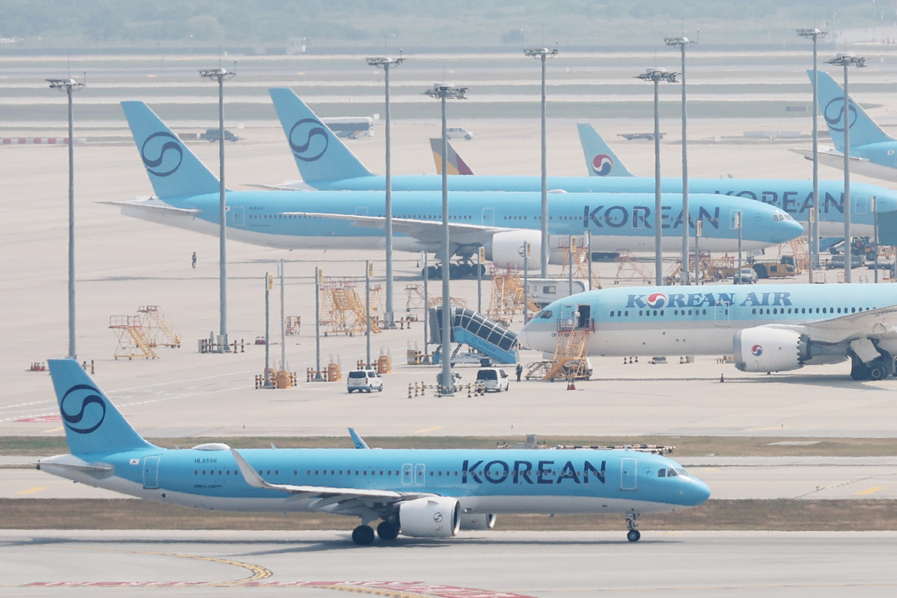 In this file photo, Korean Air aircraft are parked at Incheon International Airport in Incheon, west of Seoul, on June 16, 2026. (Yonhap)