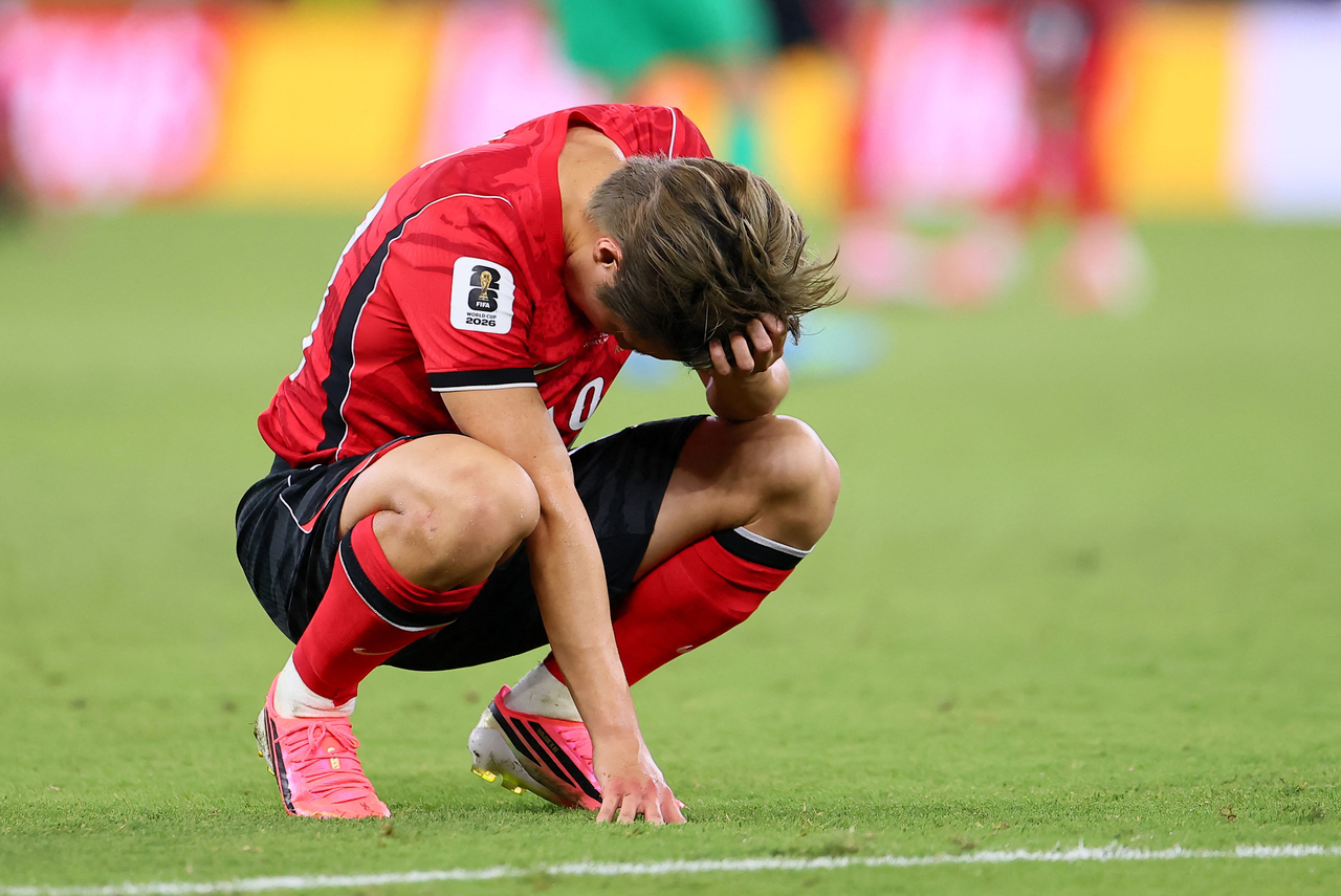 Lee Kang-in reacts after South Korea's match against South Africa on Wednesday. (Reuters-Yonhap)