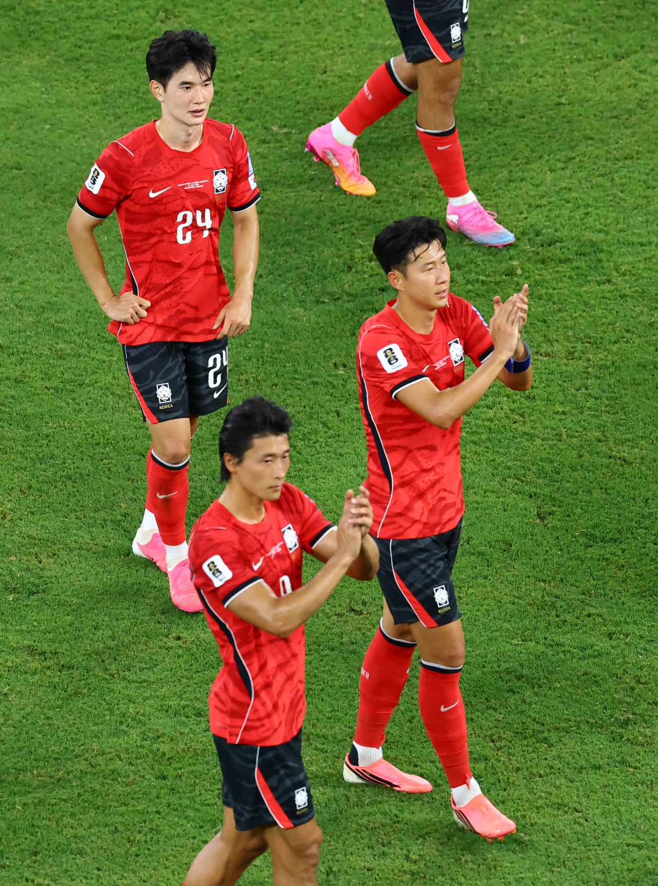 South Korean players react after their game against South Africa on Wednesday. (Reuters-Yonhap)