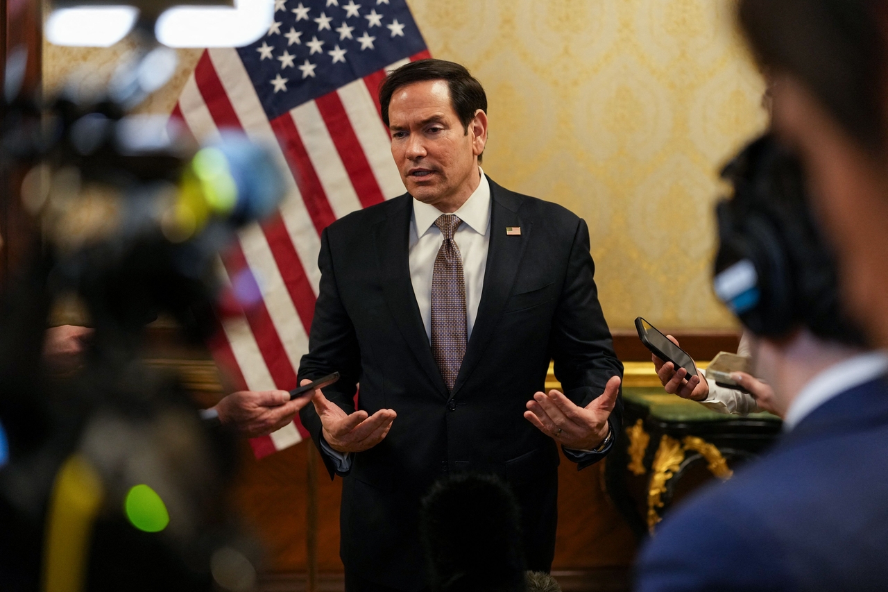 US Secretary of State Marco Rubio speaks to members of the media before boarding a US Air Force C-17 Globemaster III transport aircraft en route to Bahrain at Kuwait International Airport during his visit to the Middle East to discuss the interim deal between the US and Iran with Arab Gulf allies, in Kuwait City, on June 24. (AFP-Yonhap)