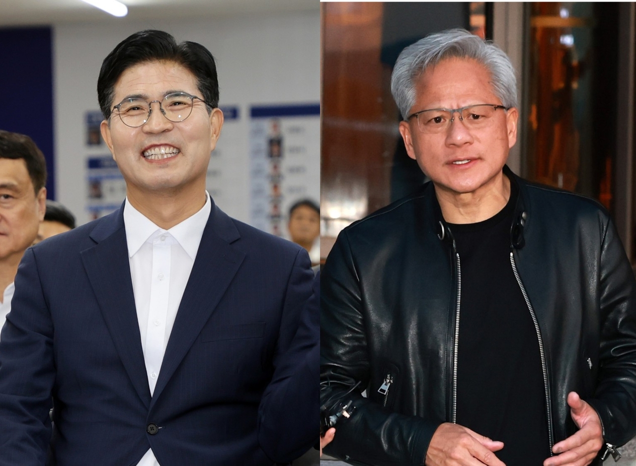 North Jeolla Province Governor-elect Lee Won-taeg (left) and Nvidia founder and CEO Jensen Huang (Yonhap)