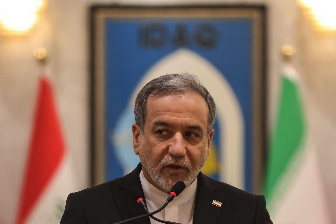 Iranian Foreign Minister Abbas Araqchi speaks during a joint press conference with his Iraqi counterpart following a meeting in Baghdad on Sunday. (AFP-Yonhap)