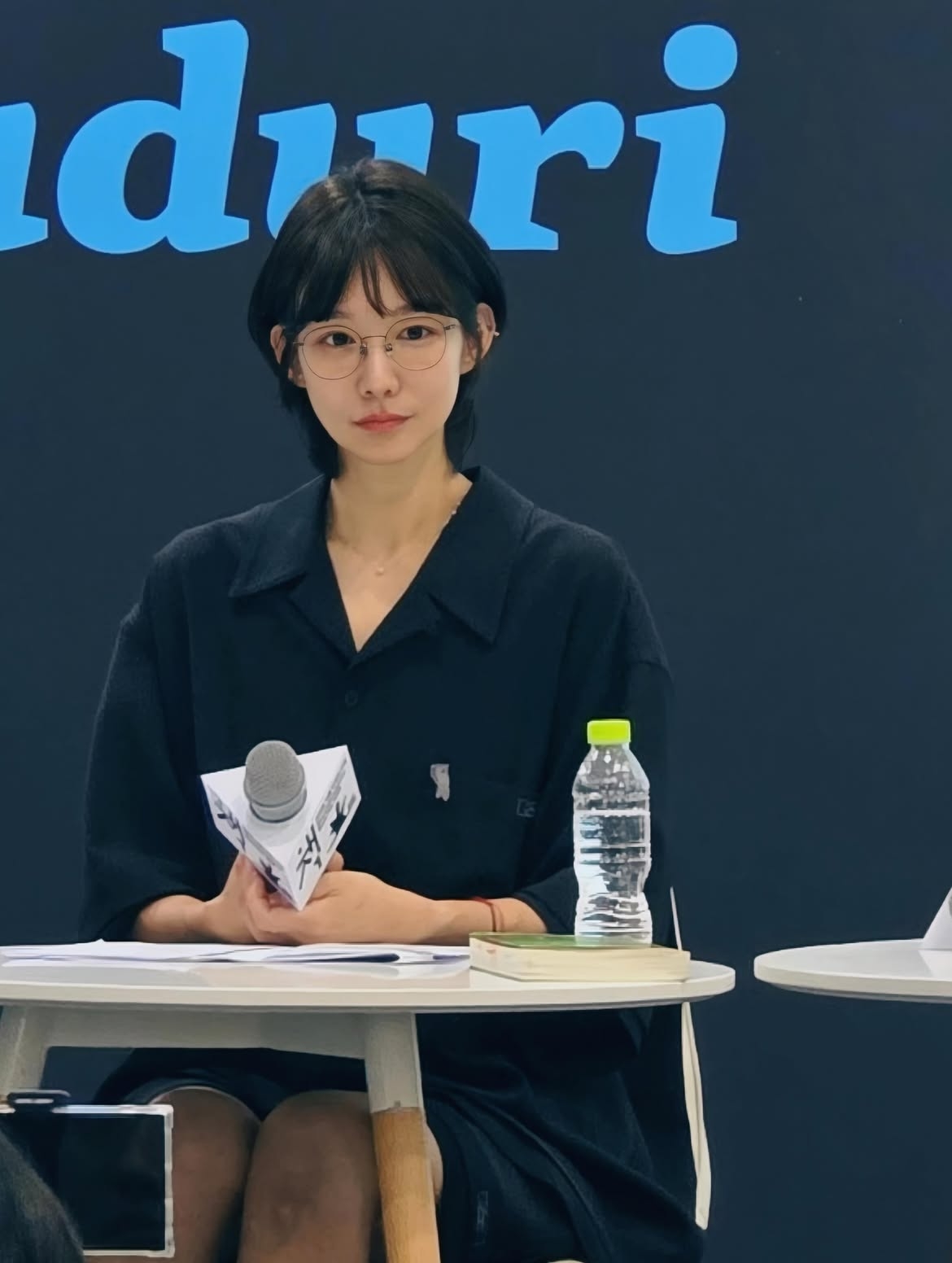 Actor Shin So-yul participates in an audiobook reading at the 2026 Seoul International Book Fair on Saturday. (@shin_so_yul)