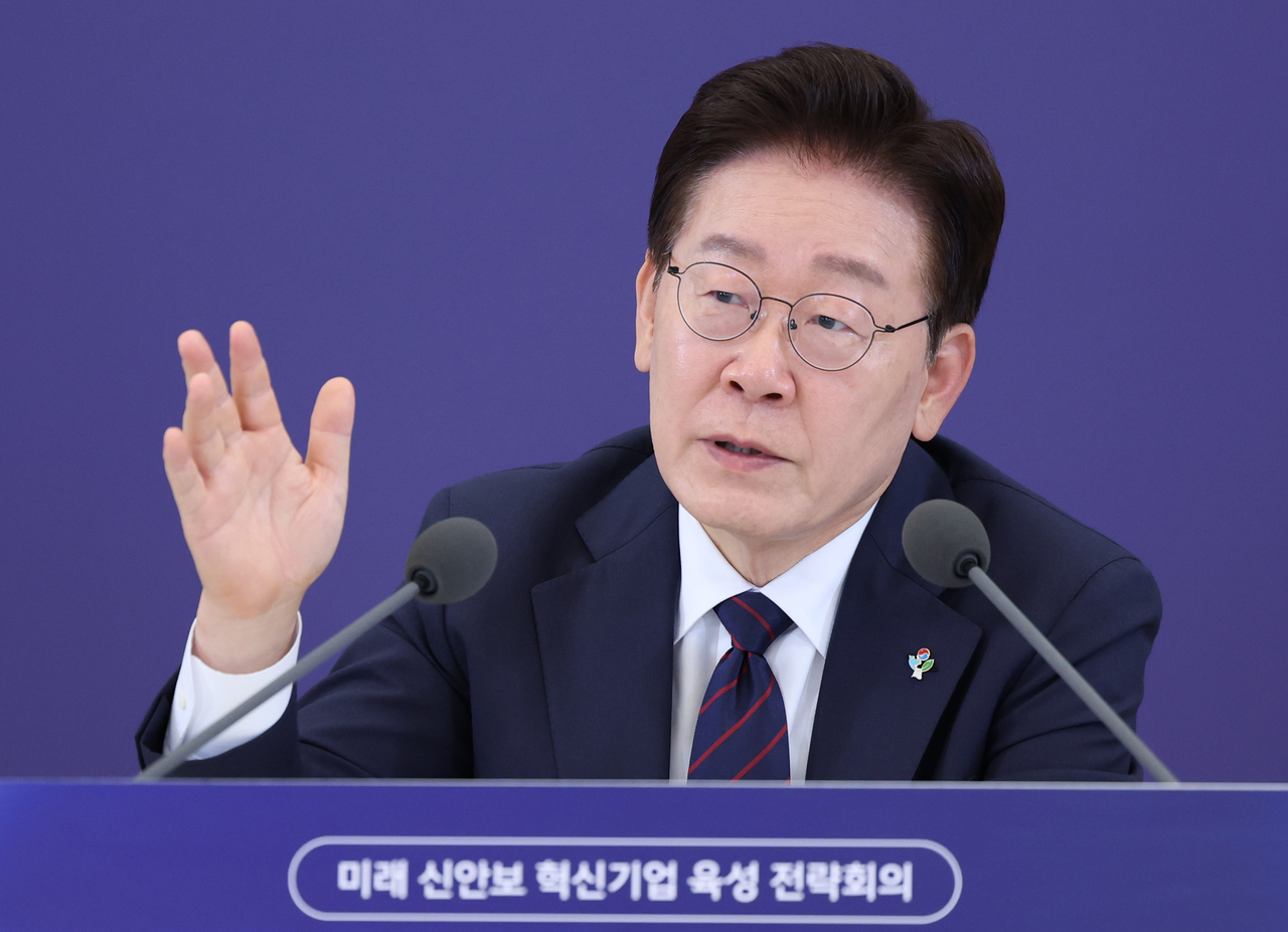 President Lee Jae Myung speaks during a government meeting on fostering innovative companies in the defense and security sectors at Cheong Wa Dae in Seoul on Friday. (Yonhap)