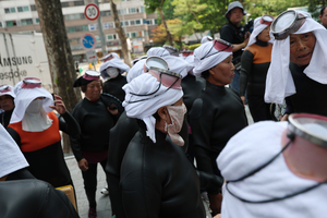 Angry 'sea women' take to street