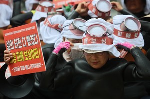 Angry 'sea women' take to street