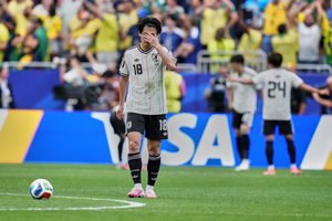 Japan eliminated from World Cup after late loss to Brazil