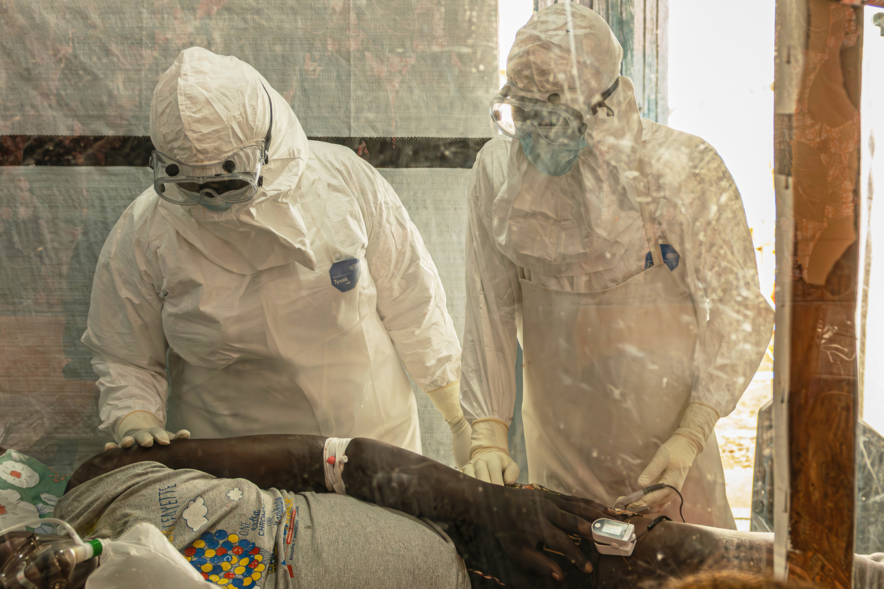FILE - Health workers attend to an Ebola patient at the Rwampara treatment Center in Ituri, Congo, Thursday, June 18, 2026. (AP Photo/Moses Sawasawa, file) FILE PHOTO