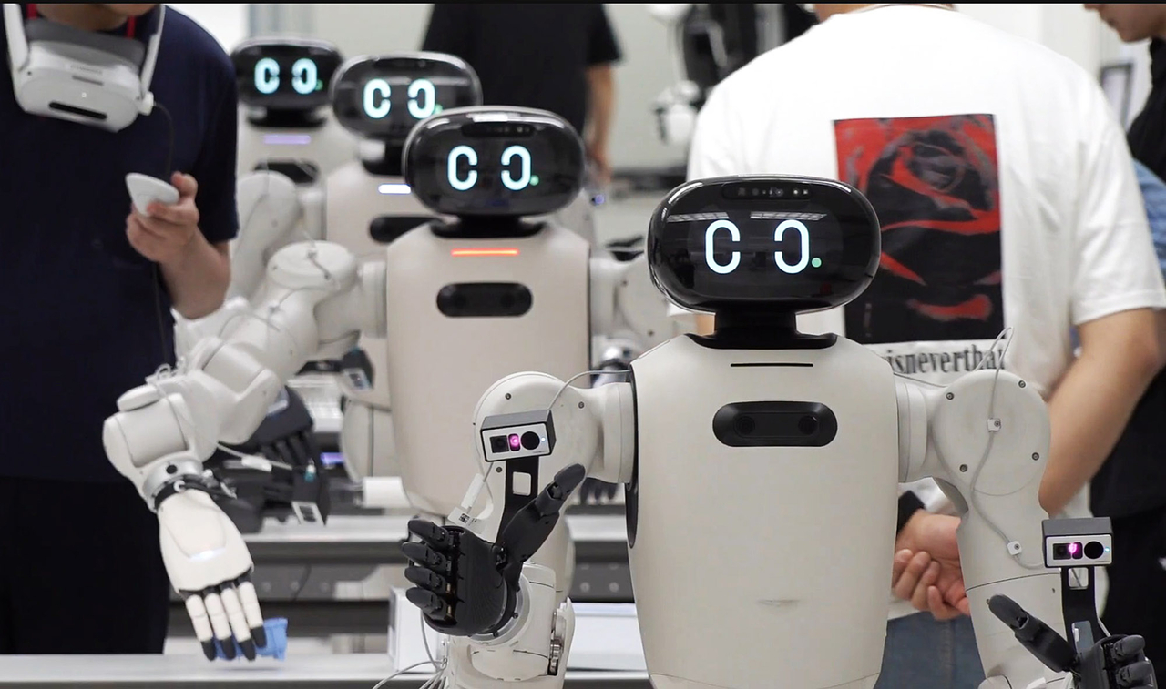 LG's CLOiD robots perform diverse movements at LG Electronics' Yangjae data factory in Seoul, generating data for robot training. (LG Electronics)