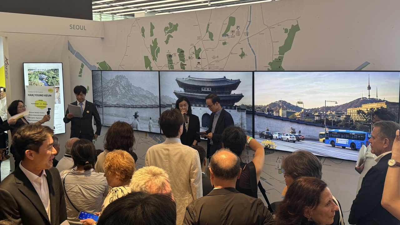 Participants look around an exhibition pavilion on Seoul architecture at the 2026 UIA World Congress of Architects in Barcelona, Spain, Monday. (Seoul Metropolitan Government)