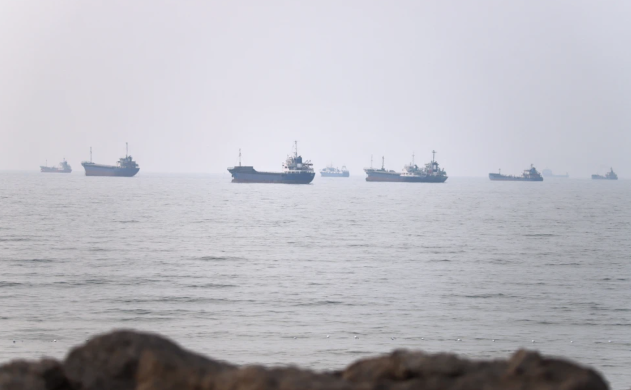 Commercial vessels are seen in the Strait of Hormuz off Bandar Abbas, Iran, Tuesday, Tuesday. (AP via Yonhap)
